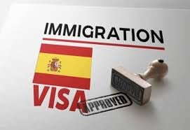 Spanish flag with IMMIGRATION and VISA text, stamped with an approved stamp